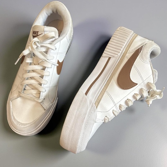 Nike Shoes - NIKE white with brown swoosh leather shoes 8
